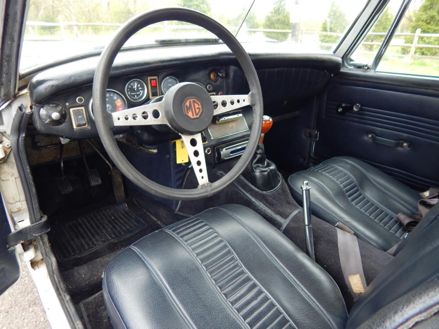 1972 White /Black MG Midget (GAN5UC10613) with an 4 cylinder engine, 4 speed manual transmission, located at 6528 Lower York Road, New Hope, PA, 18938, (215) 862-9555, 40.358707, -74.977882 - Here for sale is very nice 1972 MG Midget convertible. Under the hood is a 4 cylinder which puts power to the rear wheels via a 4 speed manual transmission. Features include; black vinyl interior in great shape, wooden shift knob, AM/FM/CD, Sony head unit, Black vinyl convertible top, chrome bumpe - Photo#10